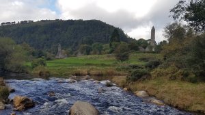 Creek, Church and tower in the distance.