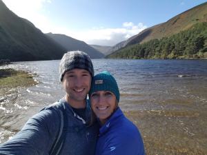 Jill and Shane share a hug around by the lake