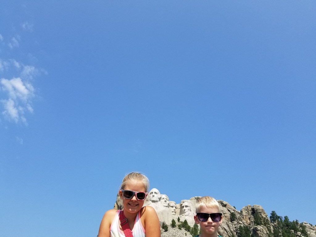 The kids doing their best Mount Rushmore face impressions