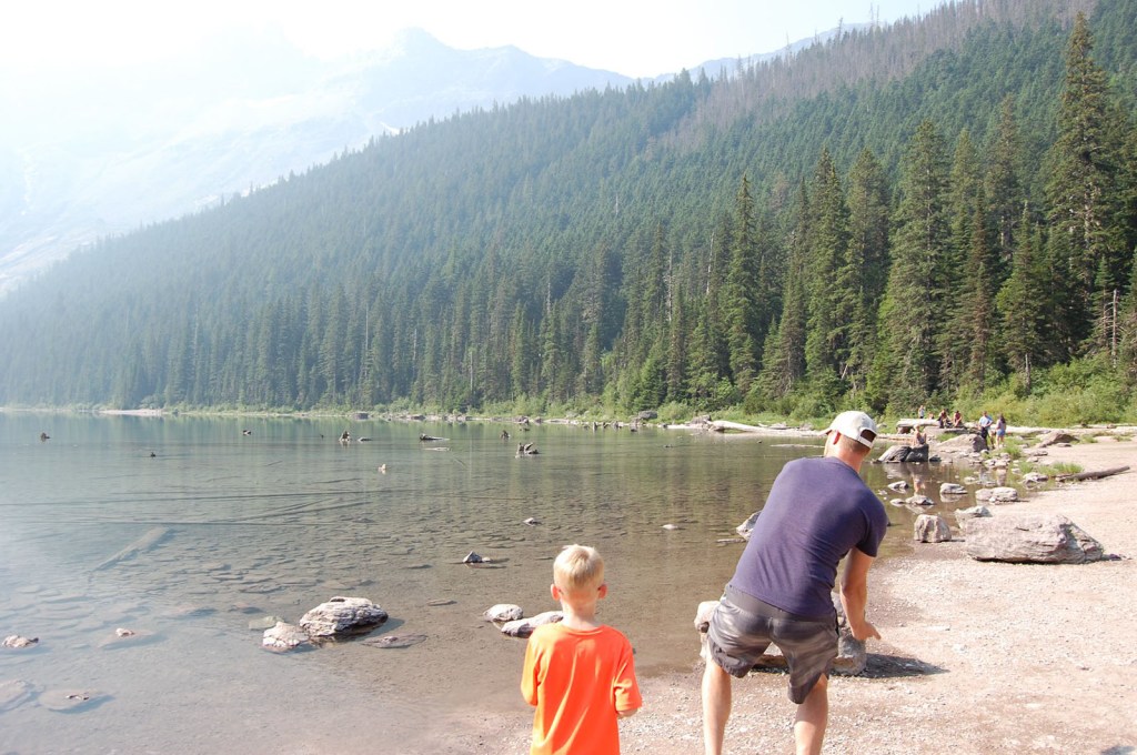 Boys skipping rocks on Avalanche Lake