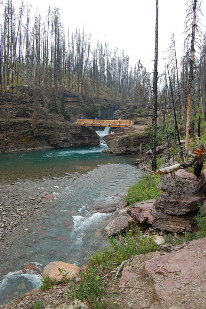 A bridge over rushing water