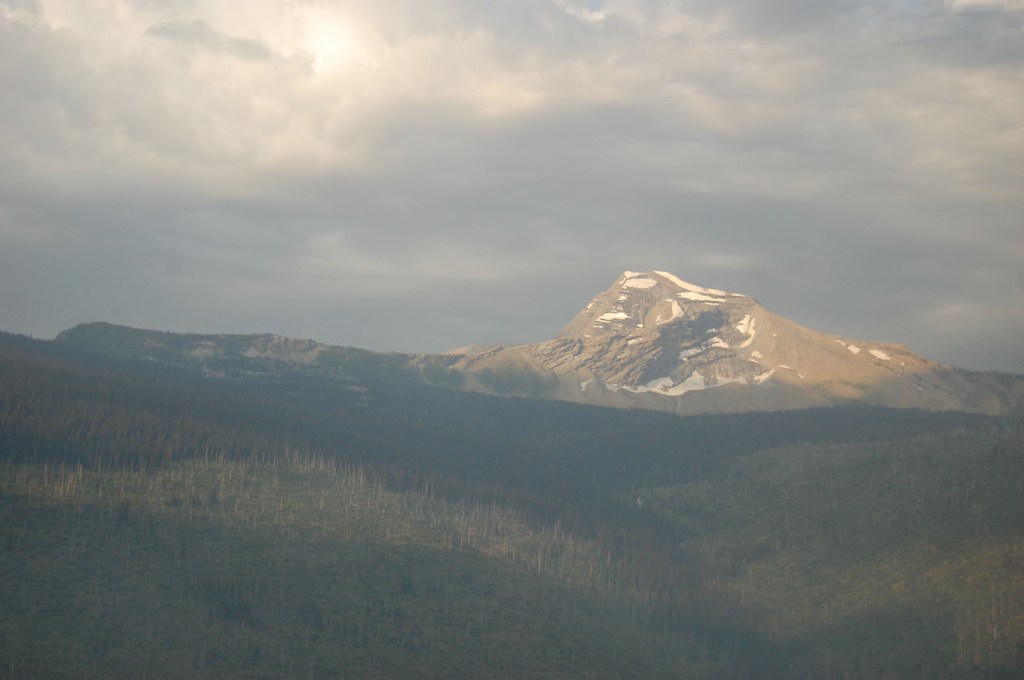 Sun on a mountain peak at Glacier National Park