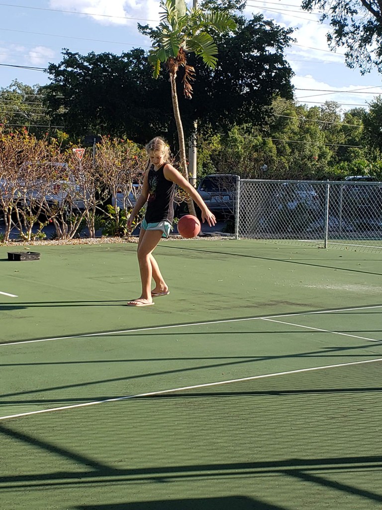 Girl Dribbling Basketball