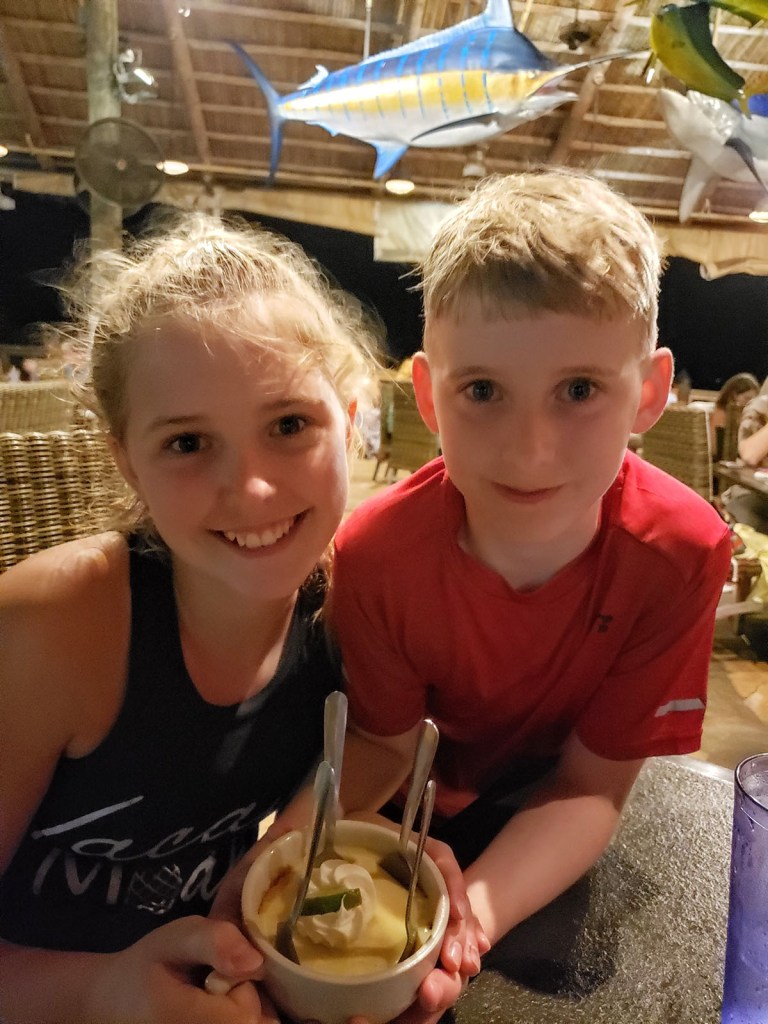 Kids smiling with their key lime pie