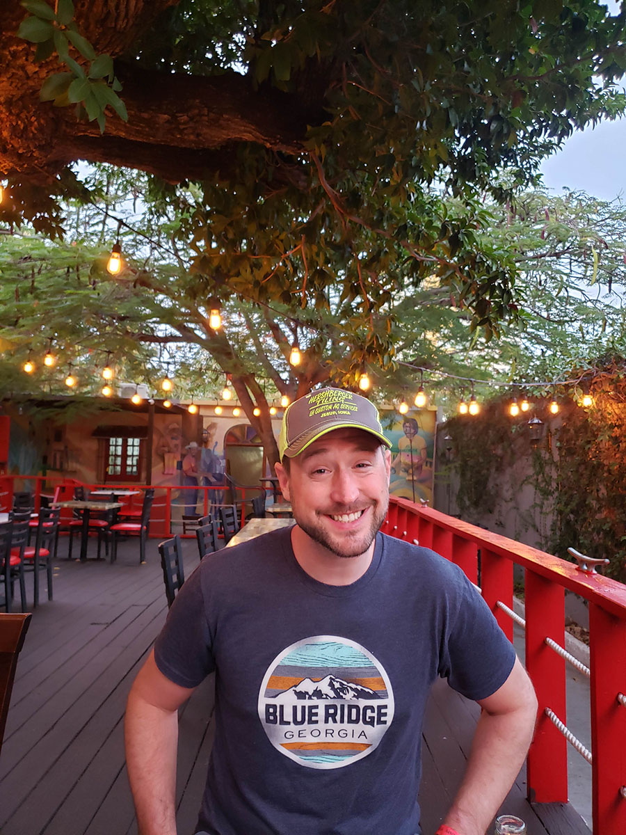 Me sitting under the tree on the patio