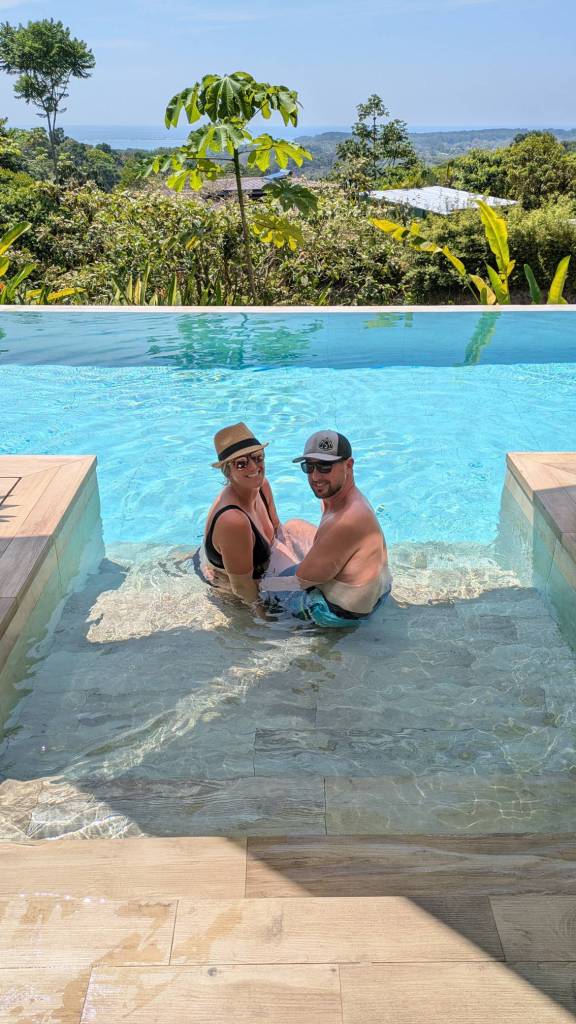 Jill and I sit in our pool at Case Futura in Uvita