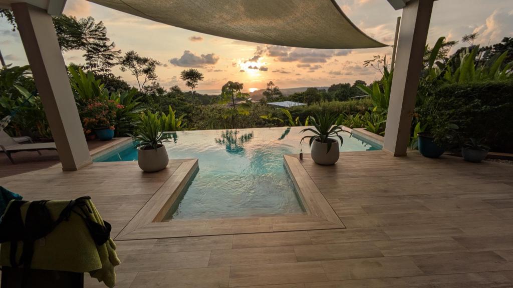 Our view from the pool, the sunsetting in the background