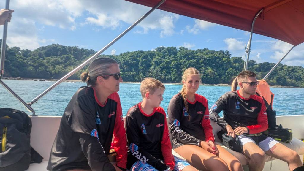 Sitting in a boat heading out to sea