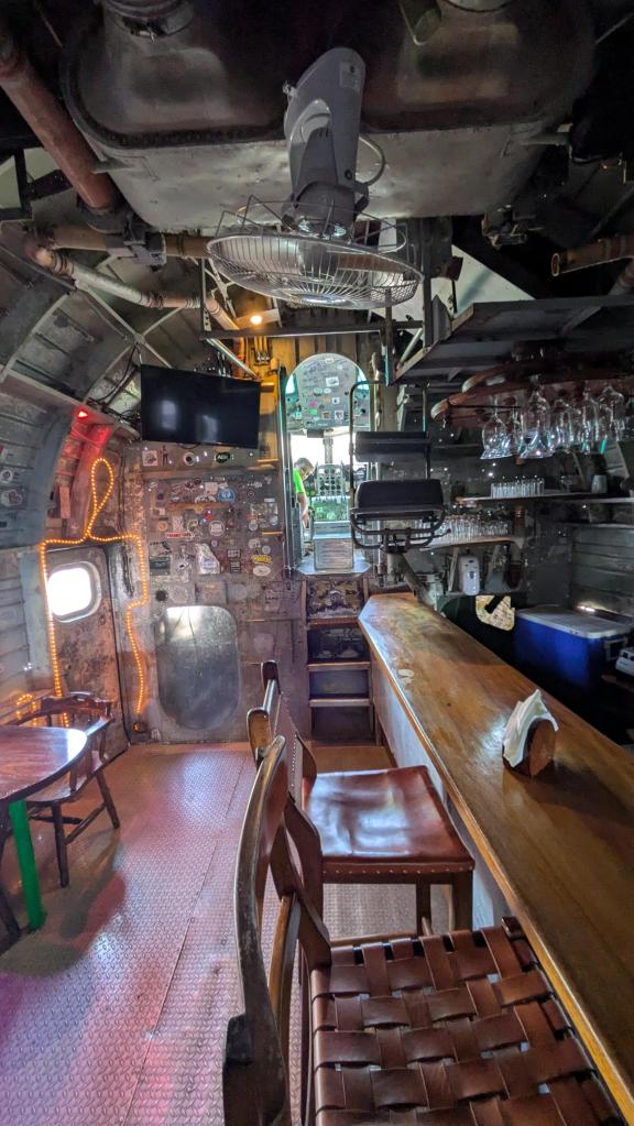 The interior of a bomber airplane turned into a bar