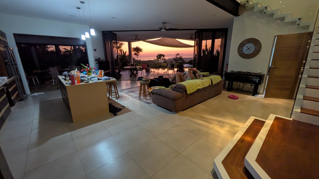 Casa Futura from inside when the sun is setting; the sky orange and purple.