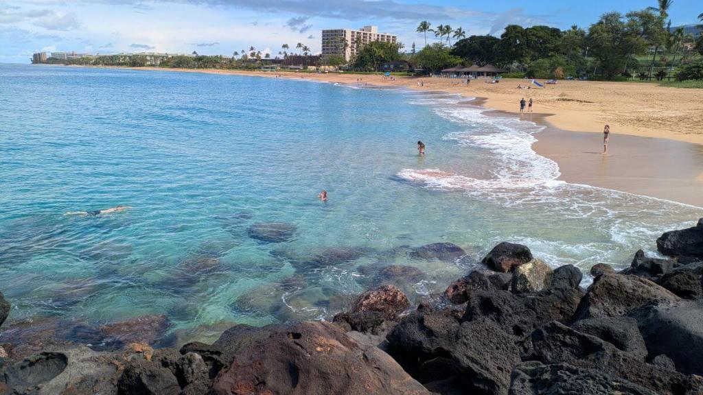 View the beach from the Kekaa Landing Pier near Black Rock