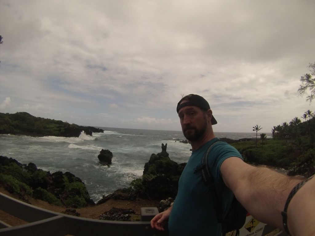 I took a selfie at the black sand beach at Waianapanapa State Park