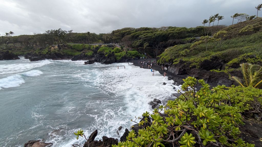 The black sand beach from above, taken from the cliffs to the west. 